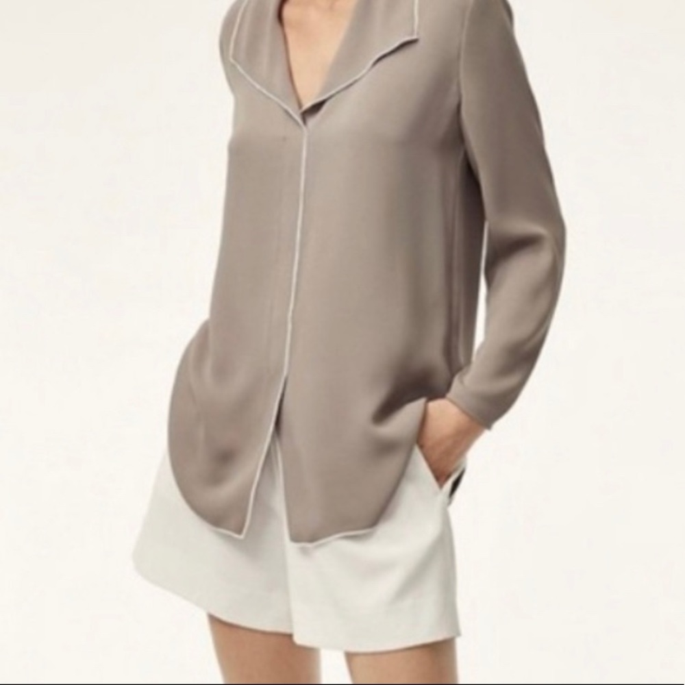 Aritzia Rena Shirt by Babaton. Color light dusty pink with white trim.